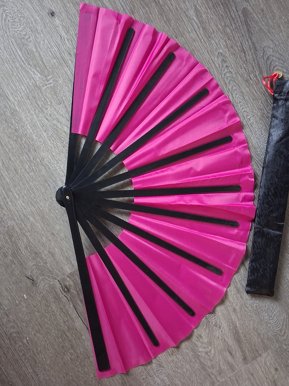 Bright Pink Folding Hand Fan with Black Ribs